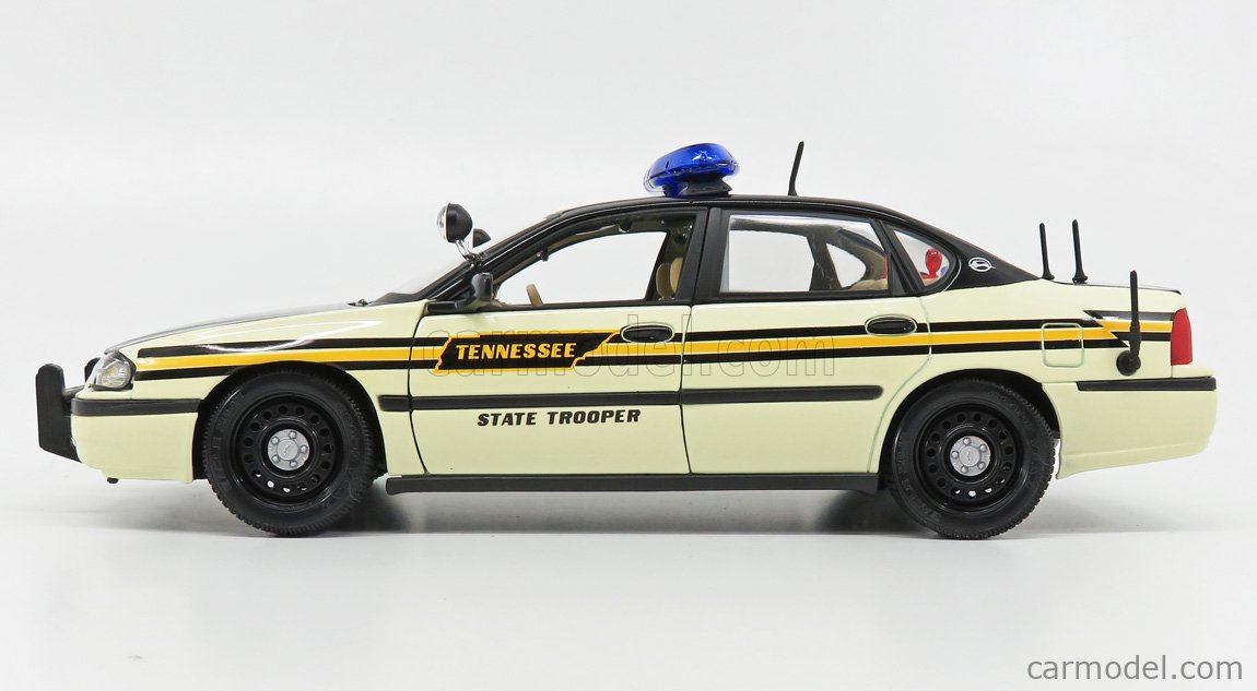 A Chicago Yellow Cab Chevy Impala taxi in front of Place B
