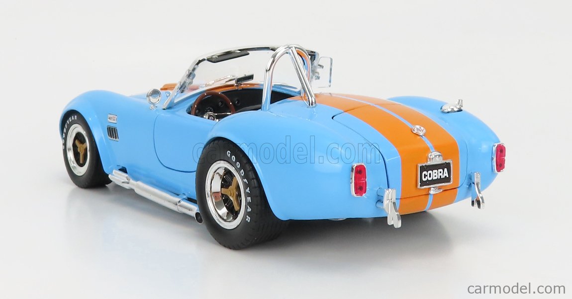 SHELBY-COLLECTIBLES SHELBY129 Masstab: 1/18  FORD USA SHELBY COBRA 427 S/C SPIDER 1962 LIGHT BLUE ORANGE
