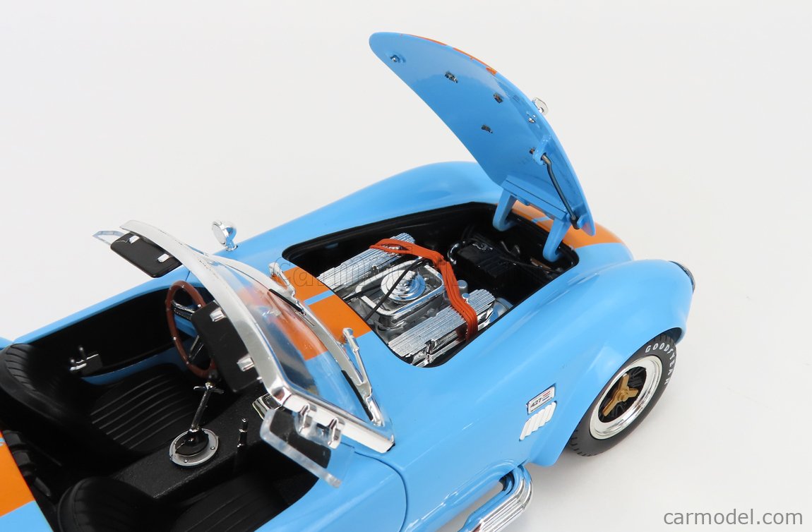 SHELBY-COLLECTIBLES SHELBY129 Scale 1/18  FORD USA SHELBY COBRA 427 S/C SPIDER 1962 LIGHT BLUE ORANGE