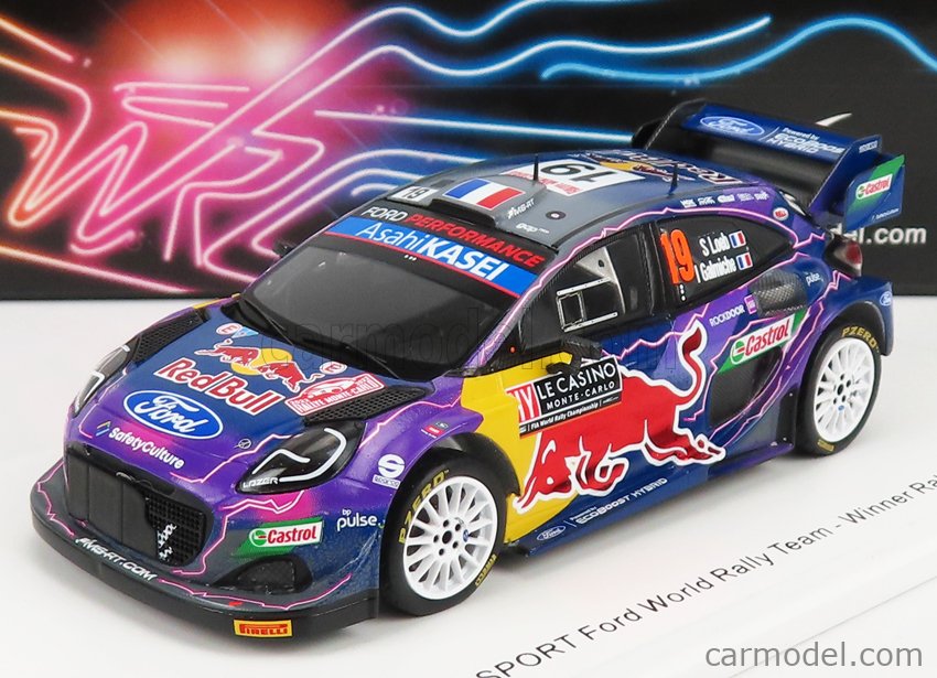 SPARK-MODEL S6697 Escala 1/43 | FORD ENGLAND RALLY1 RED FORD WORLD RALLY M-SPORT N 19 WINNER RALLY MONTECARLO S.LOEB - I.GALMICHE PURPLE YELLOW RED