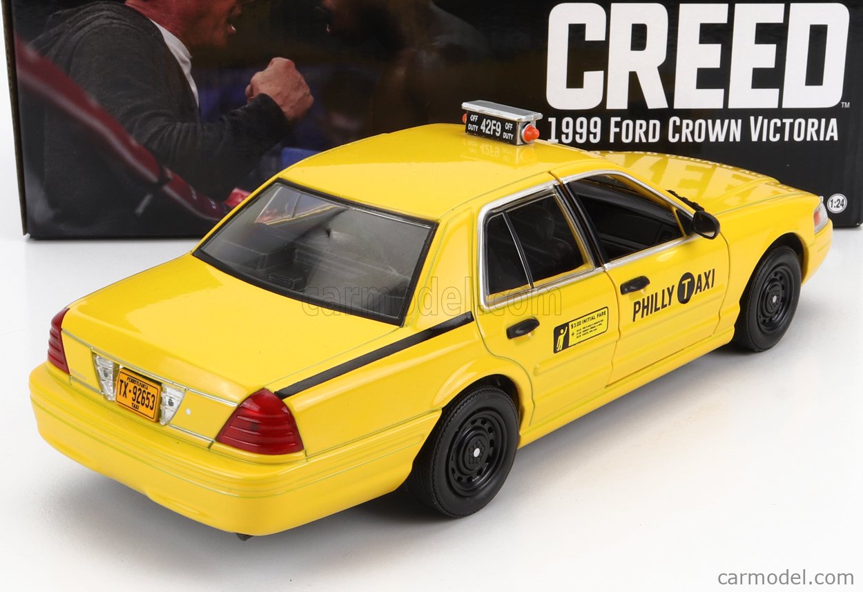 GREENLIGHT 84173 Echelle 1/24  FORD USA CROWN VICTORIA PHILLY TAXI 2015 - CREED YELLOW